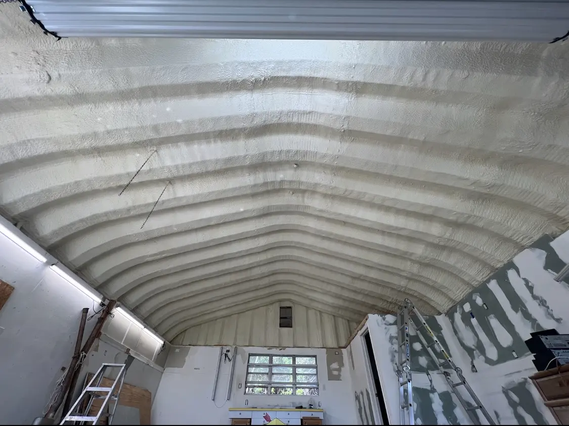 Spray polyurethane foam applied to the underside of a metal roof deck in Walla Walla